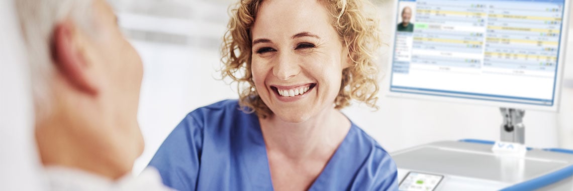 Nurse with patient at the point of care